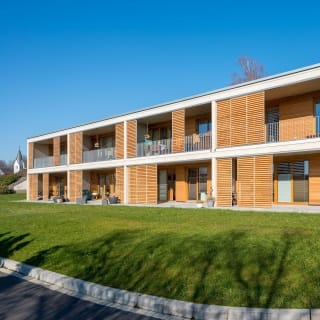 Zwei Mehrfamilienhäuser als Effizienshausstandart 40+