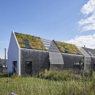 Haus mit grünem Fußbadruck