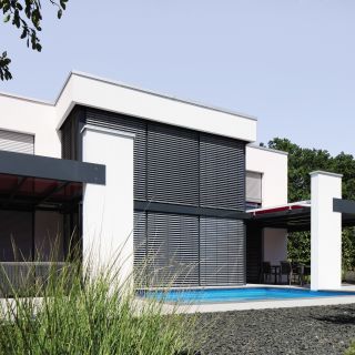 Passivhaus mit stilvollen Hitzeschutz