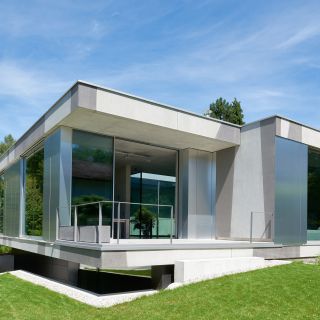 Einfamilienhaus - Reflektion mit Durchlässigkeit gepaart
