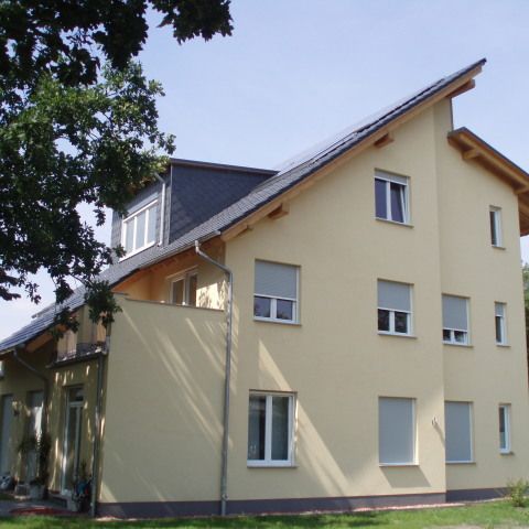Energetisch und wirtschaftlich optimiertes Wohn- und Geschäftshaus