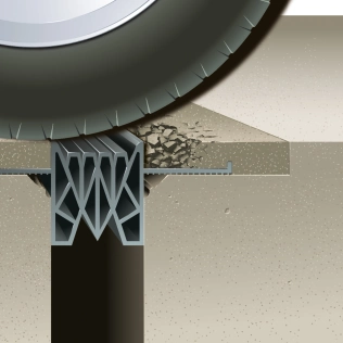Nachteile von Flügeldichtungen mit Elastomerbeton: Starke Belastungen durch Rollasten verursachen Haarrisse im Elastomer-Beton, die durch weitere Belastungen verstärkt werden, bis die Flügel der Dichtungen abreißen.