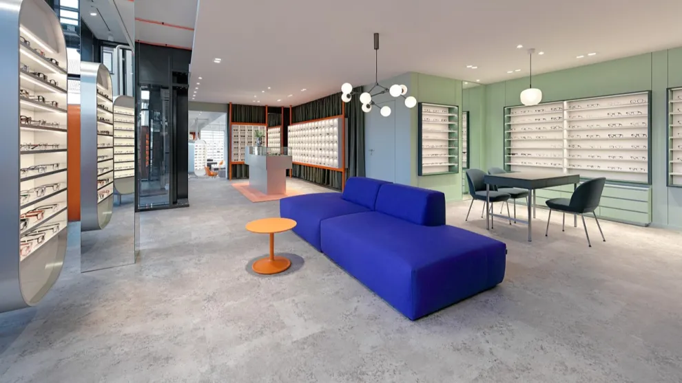 Modernes Shopkonzept von HEIKAUS mit Betonoptik ST 480 von PROJECT FLOORS.