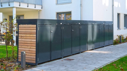 Mülltonnenboxen - Mülltonnenboxen mit Anbaumodulen für jeweils 2 Müllcontainer. Seitenwände aus Woodline Türen aus Vollblech