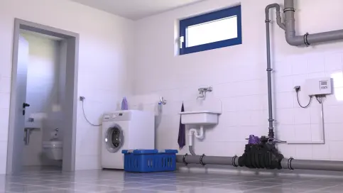 Ecolift Rückstauhebeanlage in eine freiliegende Abwasserleitung eingebaut