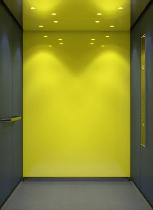 KONE DX Kabinendesign mit lebendigen Farben, modernen Materialien, Farbreflexen und kontrastreichen Oberflächen.
