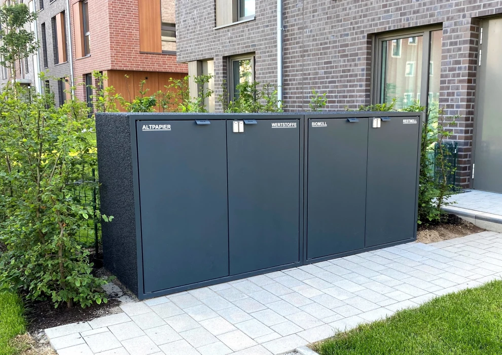 2-türige Mülltonnenschänke aus schwarzem Basaltsplitt, pulverbeschichtete Türen RAL 7016, mit Schlössern