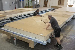 Produktion der L-systems- Holzrahmenbauelemente
